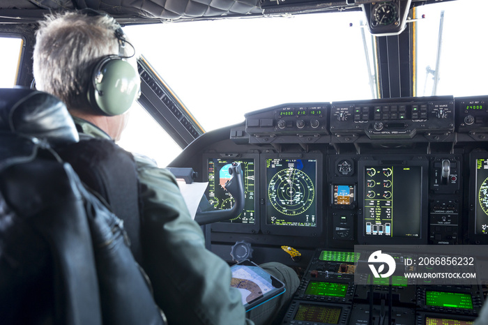 Military carrier airplane cockpit and pilots