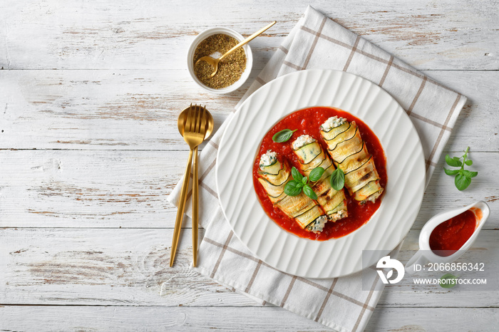 Italian appetizer: zucchini rollatini on a plate