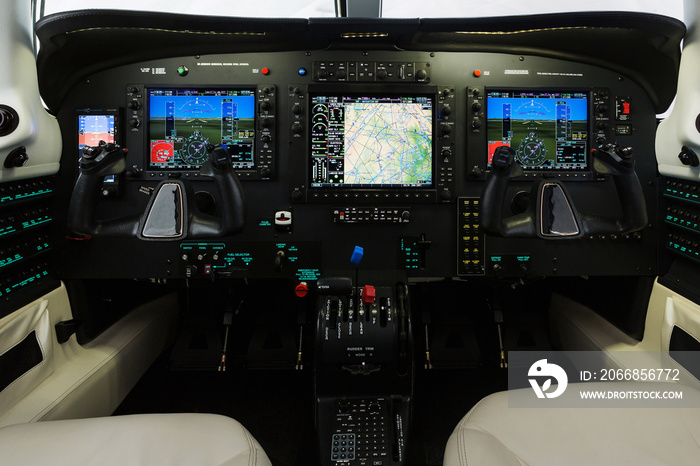 Small private motor air plane dashboard inside the cabin. Aircraft interior, cockpit view inside piston plane. The dashboard and interior small private aircraft.