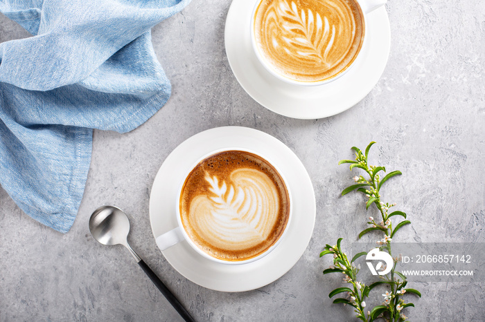 Coffee latte or cappuccino with latte art on top