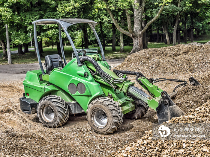 Skid loader with loaded gravel