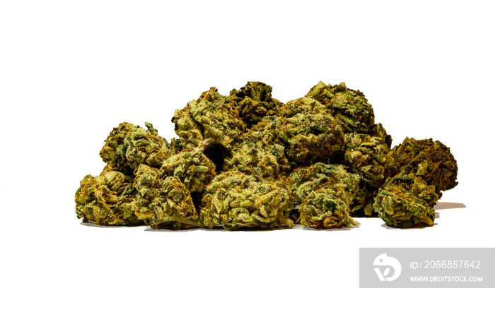 Close up of a pile of green marijuana buds isolated with a white background