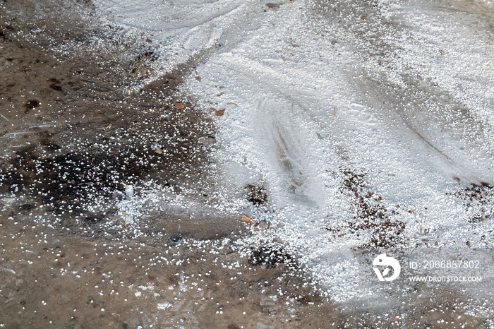 Absorbent Sweeping Powder On A Garage Floor