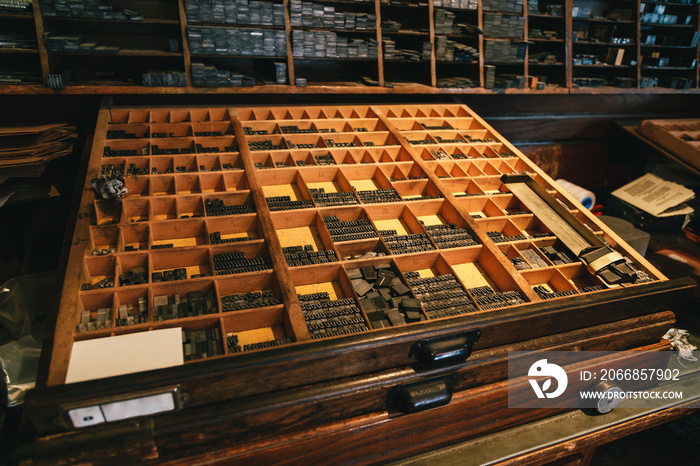 Close up of metal letters for the reconstructed wooden Gutenberg’s printing machine used for printing souvenir post cards with sealing wax stamps. In the Bled Castle on the lake Bled in Slovenia.