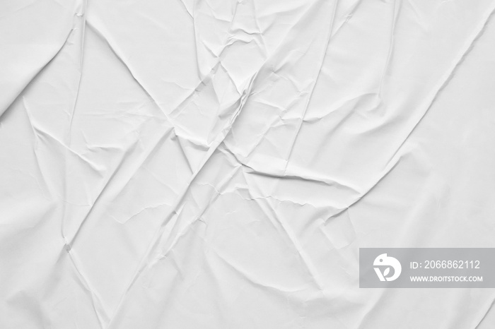 Blank white crumpled and creased paper poster texture background