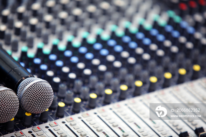 close up of professional console in recording mixer studio