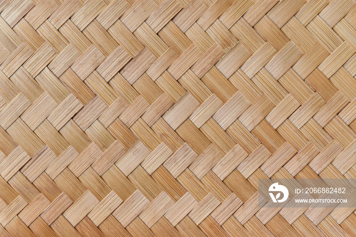 Texture of bamboo weaving. Traditional handicraft weave asian style pattern background.