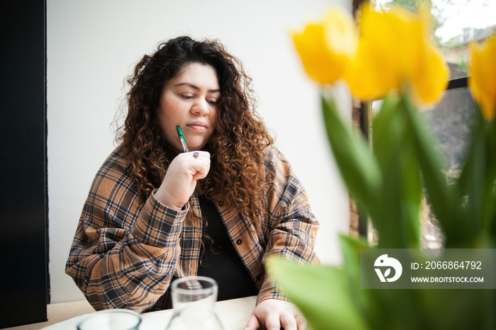 Plus-sized Sri Lankan woman with vitiligo working from home