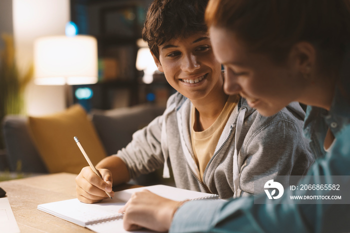 Students doing homework together at home