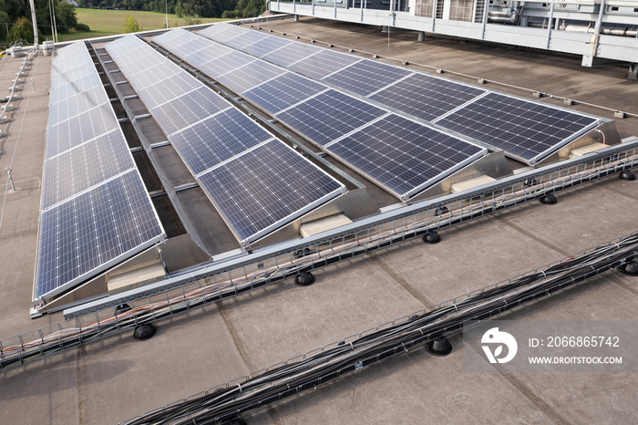 Solar panels on a flat roof.