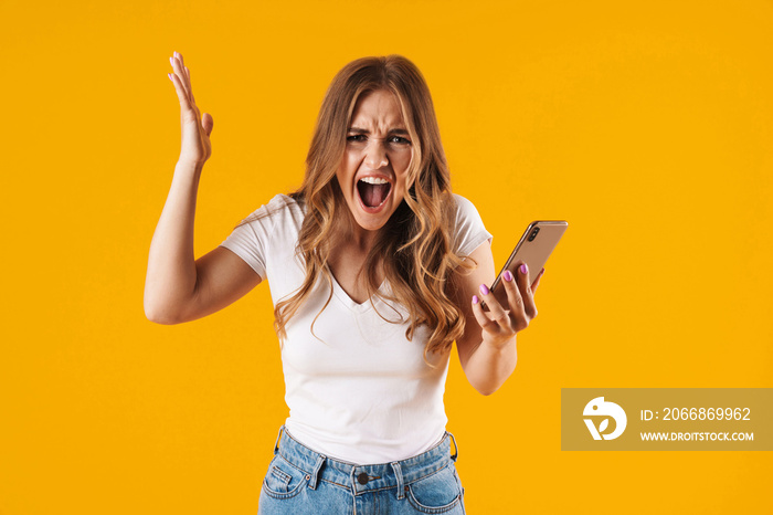 Portrait of a cheerful young casual girl standing