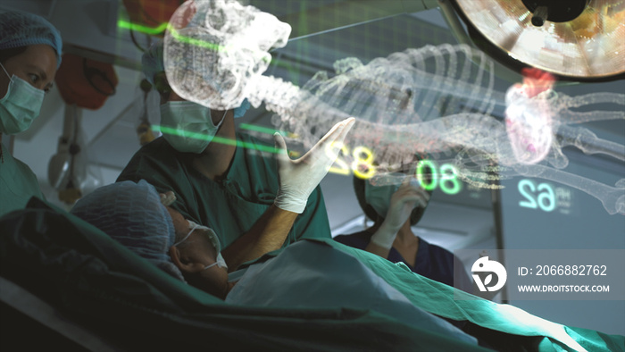 Futuristic operating room simulation - a surgeon diagnosing a senior woman’s heart problem via a holographic body scan simulation before surgical procedure. Concept hospital care