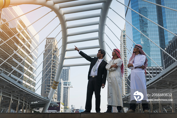 Businessman and Arab businessmen worker on construction site