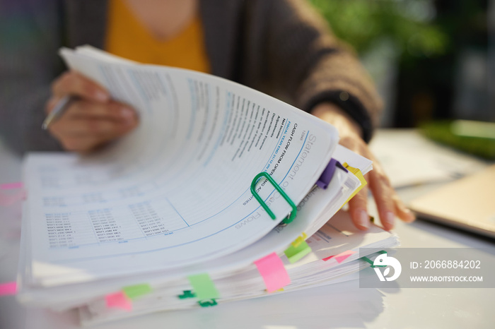 tax time. accountant woman working with documents