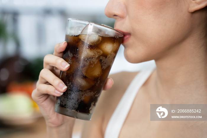 close up woman drinking soft dirnk cola