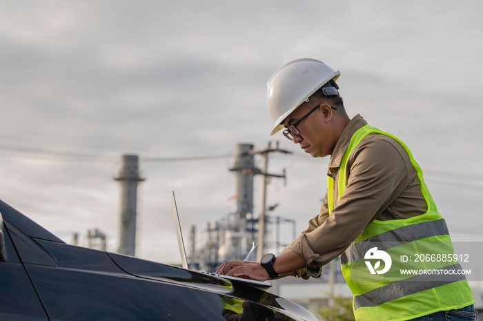 Asian man petrochemical engineer working at oil and gas refinery plant industry factory,The people worker man engineer work control at power plant energy industry manufacturing