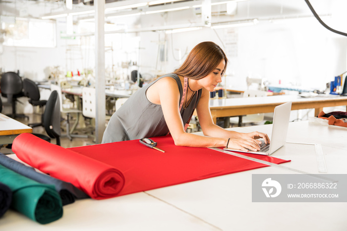 Fashion designer working in a factory