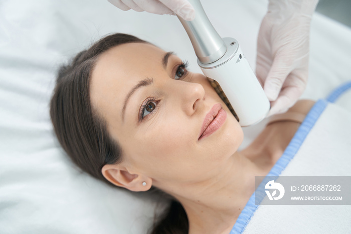 woman receives spa treatment