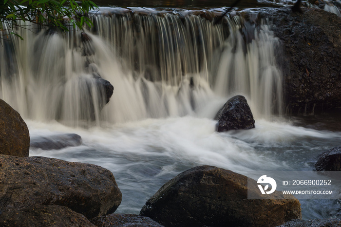 Beautiful rock waterfall in forest