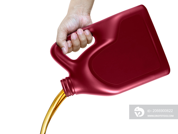 Engine oil pouring from a canister in hand isolated on white background