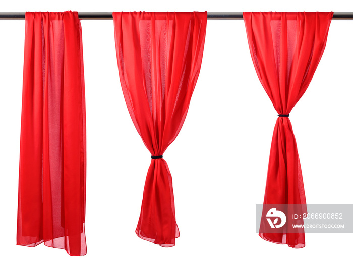 Vertical red satin curtains isolated on white.