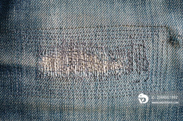 close up patch old jeans denim texture and background.