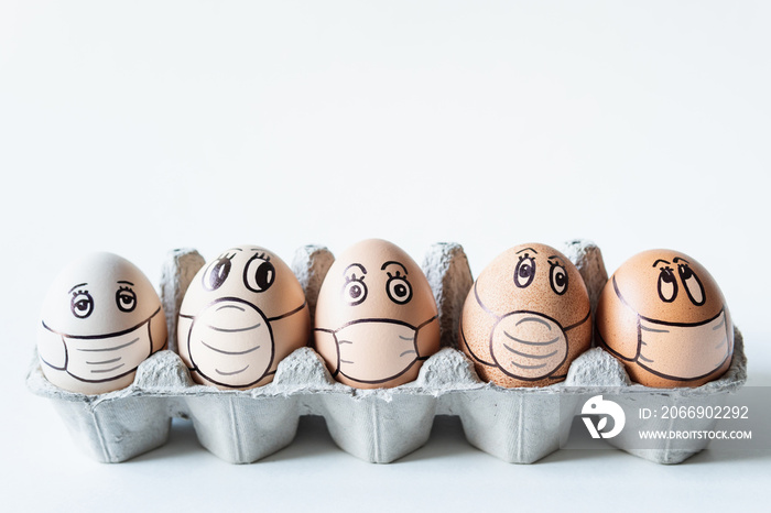 Diverse chicken eggs with doodle faces wearing medical masks with white background