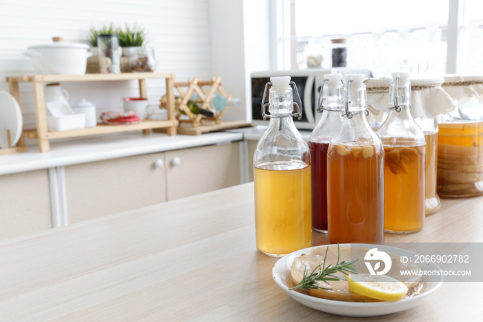 Kombucha tea in the Kitchen, Kombucha fermented drink, bacteria and yeast,  fermentation, probiotic, Scoby, mushroom pro biotic, healthy fermented tea