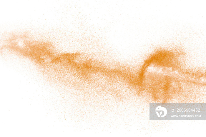 Orange powder dust particles explosion on white  background.Orange dust particles splash.
