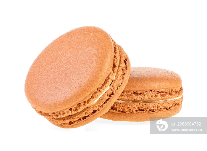 Delicious two brown macaroons on a white background