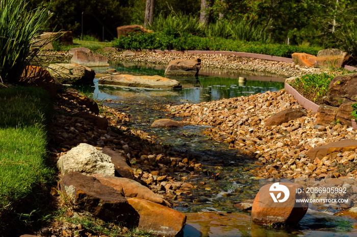 small stream over rocks at a neighborhood park in Conroe, TX