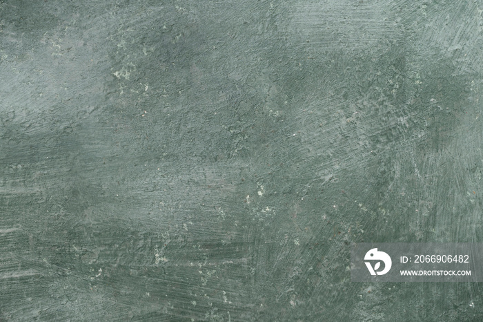 Texture of dark vintage green stone background, Wide banner. Abstract grunge decorative stucco wall texture. Wide rough background with copy space for text