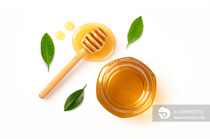 Honey jar with honey dipping and leaves isolated on white background. Top view