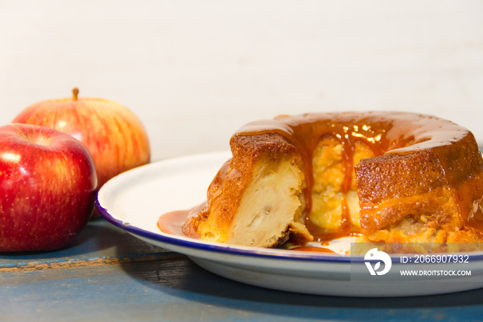 bread pudding made with stale bread, milk, eggs and sugar, decorated with liquid caramel and dulce de leche