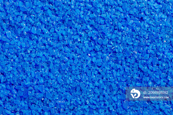 full frame background and texture of blue copper sulfate granules - close-up