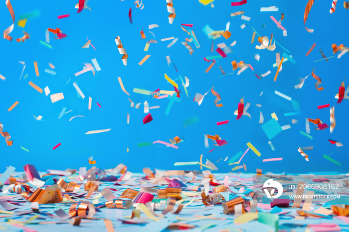 birthday confetti on blue background