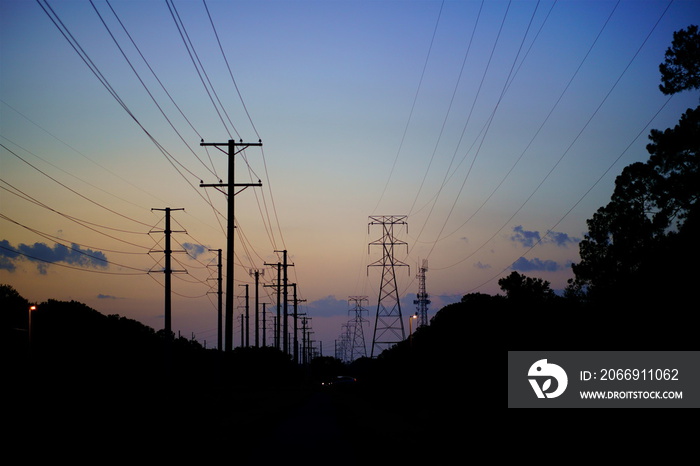 High voltage electric power line in the evening