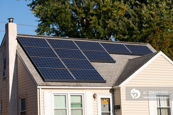 Solar photovoltaic panels on a house roof