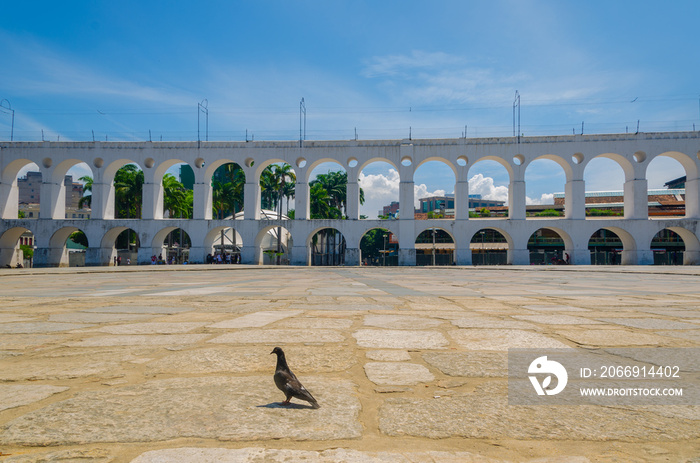 Landmark white arches of Arcos da Lapa under bright blue skies in Centro of Rio de Janeiro Brazil