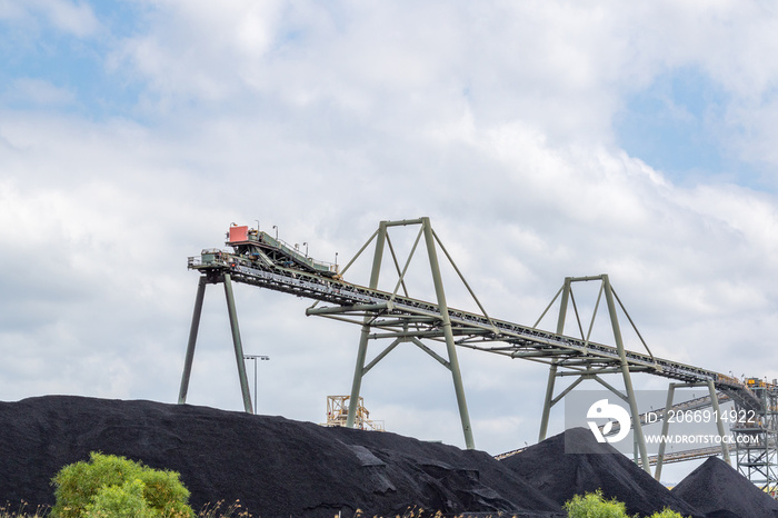 Coal mine conveyor and coal stockpile