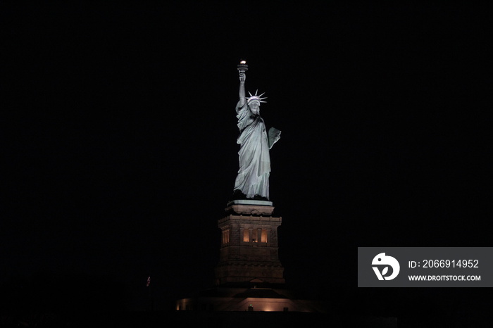 Statue of Liberty shining in the night