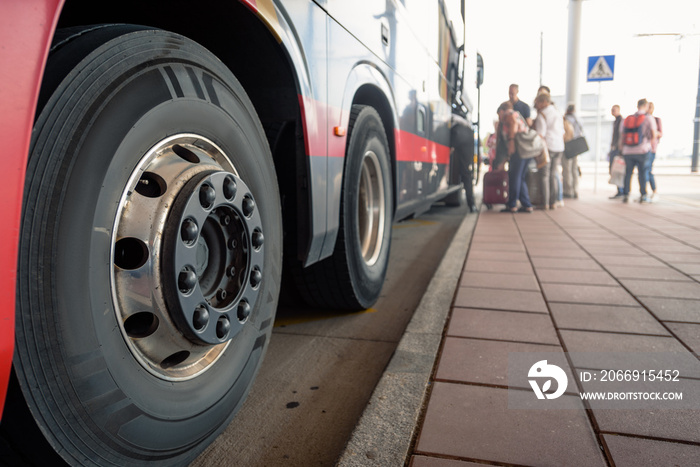 Closeup of modern public bus with open door at bus station