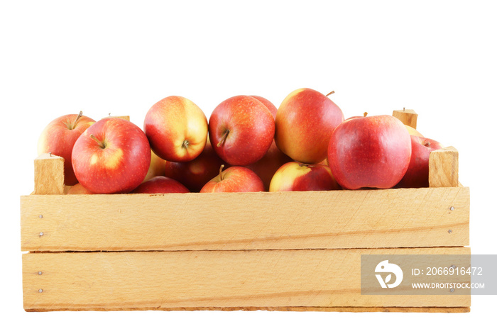 Red apples in wooden box isolated on white