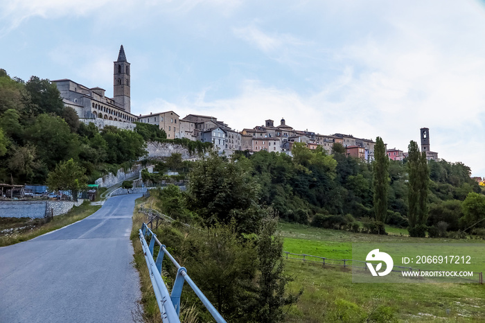 Small asphalt road, towards the old Italian medieval city, on top of the hill, Leonessa commune, Lazio region, Rieti province, Italy