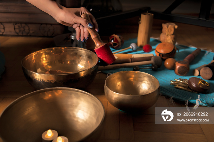 Woman in Sound healing therapy and meditation uses aspects of music to improve health and well being. Find out which sound therapy instruments can help your meditation and relaxation at home