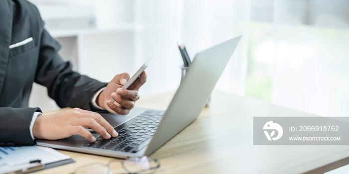 Business woman analyzing data paperwork calculating numbers..