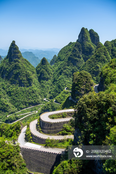 Blue sky, copy space for text, close up on the layers of the road bends on Tian Men mountain National park, Zhangjiajie, Hunan, China