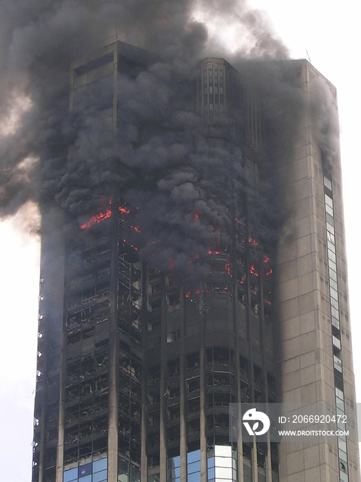 Skyscraper building on fire