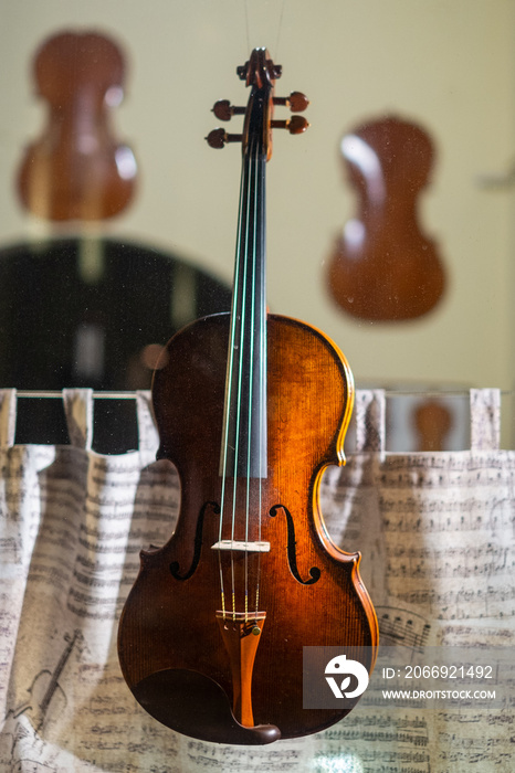 Stradivarius violin with musical notes