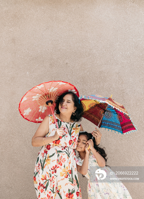 South Asian grandparent and granddaughter together